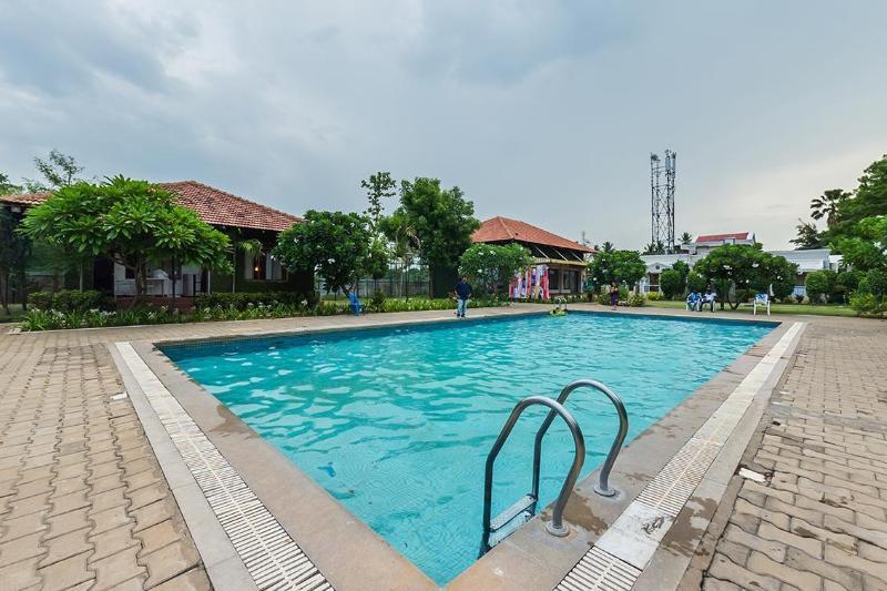Hotel Riverside Resort And Spa Kumbakonam Bagian luar foto